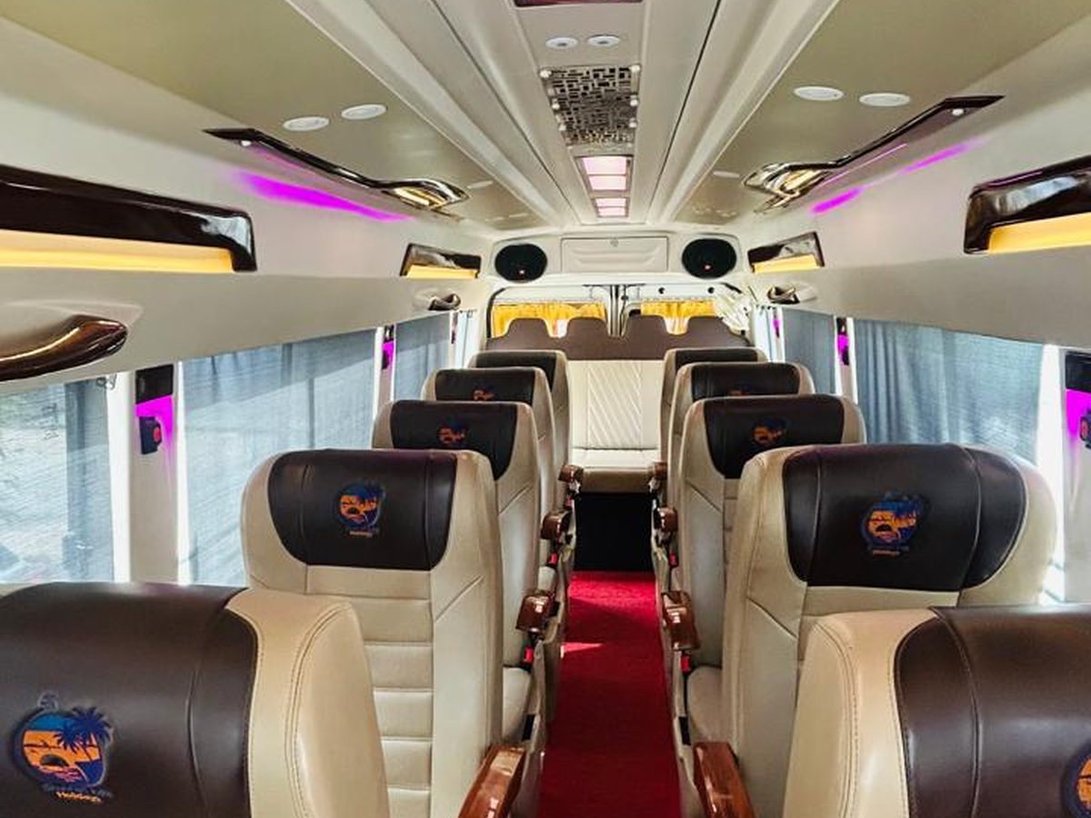 Inside a Vinayak Tours and Travels tempo traveller